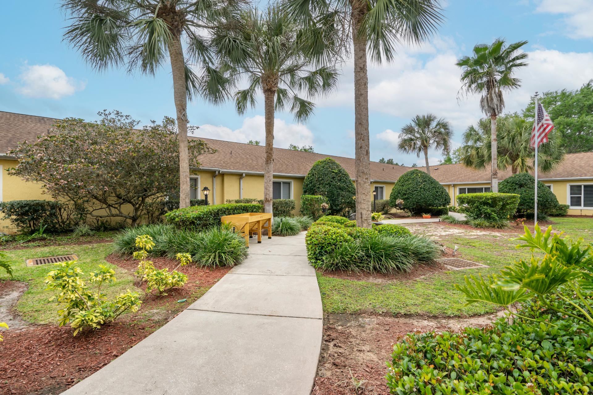 exterior garden area with gazebo seating and fountain